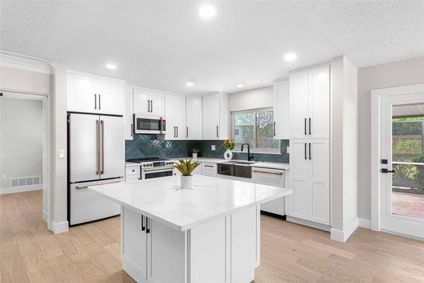Interior, Kitchen, Recessed Lighting, Stainless Steel Appliances, Wood Texture Flooring
