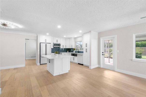 Interior, Kitchen, Recessed Lighting, Stainless Steel Appliances, Wood Texture Flooring
