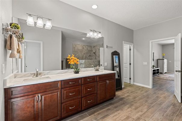 Bathroom, Dual Sink Vanities, Interior, Recessed Lighting, Wood Texture Flooring