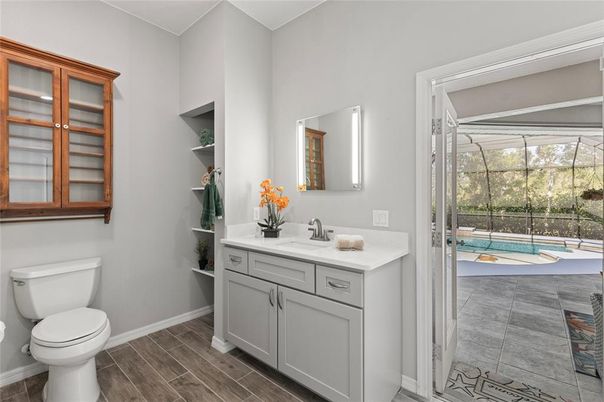 Bathroom, Glass Shower, Interior, Pool, Sun Room, Wood Texture Flooring