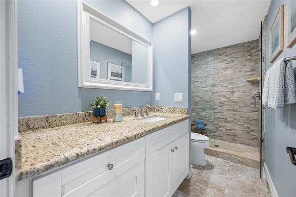 Bathroom, Dual Sink Vanities, Interior, Recessed Lighting, Stone Walls