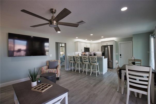Dining room, Interior, Kitchen, Recessed Lighting, Stainless Steel Appliances, Wood Texture Flooring