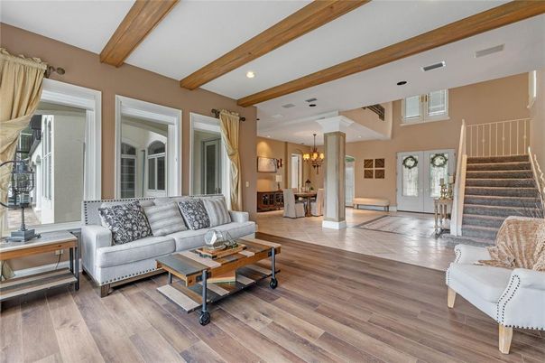 Chandelier, Interior, Living room, Recessed Lighting, Wooden Beams, Wood Texture Flooring