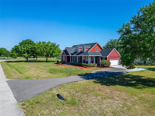 Attached, Backyard, Detached Garage, Exterior, Facade, Brick Facade, Cape Cod