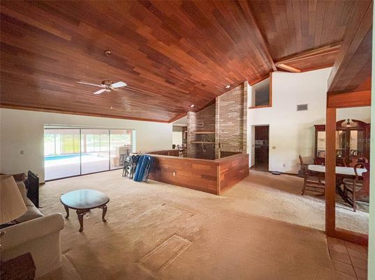 Dining room, Fireplace, Interior, Recessed Lighting, Stone Walls, Wooden Ceilings