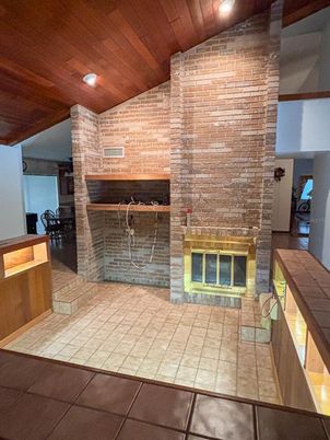 Fireplace, Interior, Recessed Lighting, Stone Walls, Wooden Ceilings