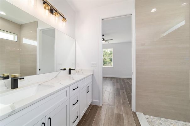Bathroom, Dual Sink Vanities, Interior, Recessed Lighting, Wood Texture Flooring