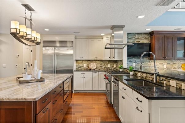 Chandelier, Interior, Kitchen, Recessed Lighting, Stainless Steel Appliances, Wood Texture Flooring