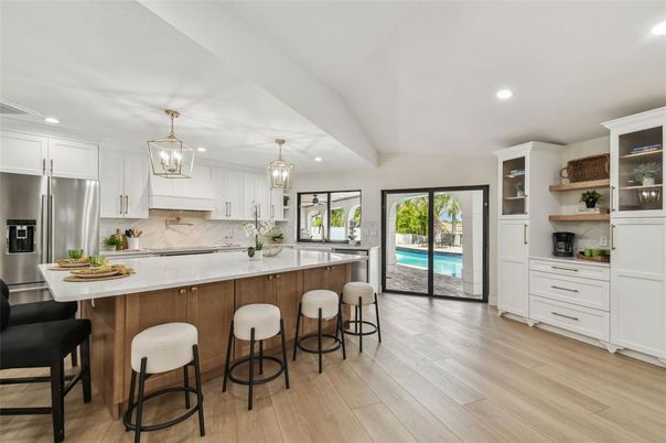 Interior, Kitchen, Pendant Lights, Recessed Lighting, Stainless Steel Appliances, Wood Texture Flooring
