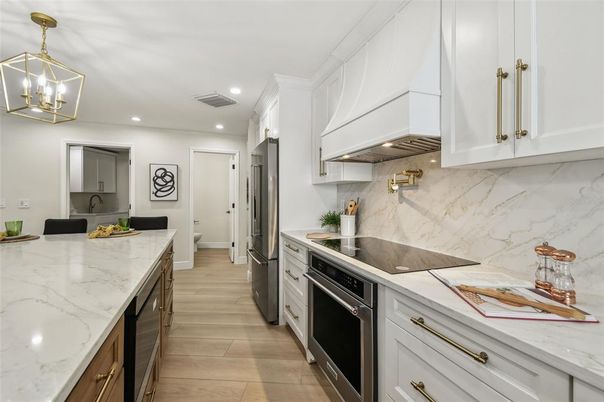 Interior, Kitchen, Marble Walls, Pendant Lights, Recessed Lighting, Wood Texture Flooring