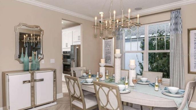 Chandelier, Dining room, Interior, Kitchen, Pendant Lights, Stainless Steel Appliances, Wood Texture Flooring