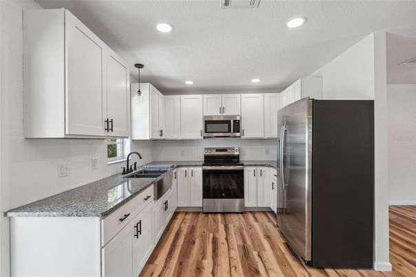 Interior, Kitchen, Pendant Lights, Recessed Lighting, Stainless Steel Appliances, Wood Texture Flooring