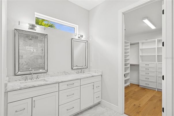 Bathroom, Dual Sink Vanities, Interior, Walk-in Closets, Wood Texture Flooring
