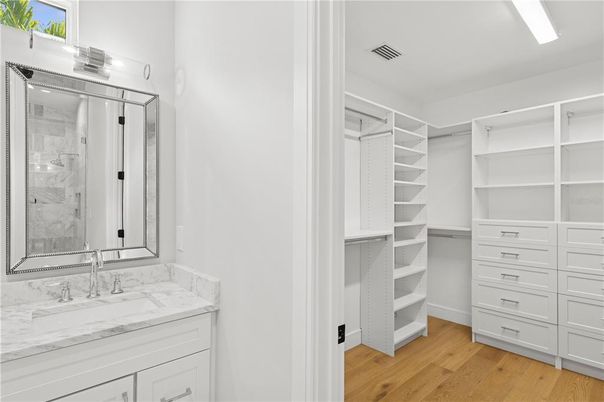 Bathroom, Dual Sink Vanities, Glass Shower, Interior, Walk-in Closets, Wood Texture Flooring