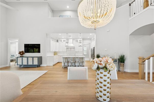 Chandelier, Dining room, Fireplace, Interior, Kitchen, Pendant Lights, Recessed Lighting, Wood Texture Flooring