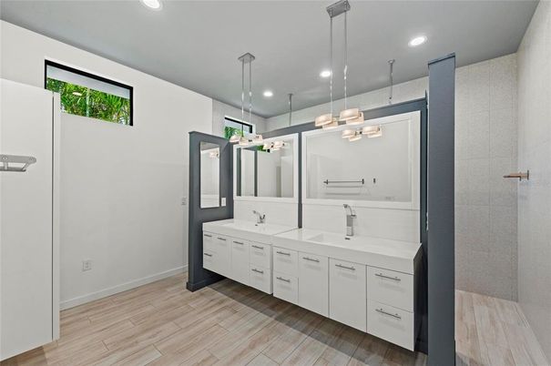 Bathroom, Dual Sink Vanities, Interior, Pendant Lights, Recessed Lighting, Wood Texture Flooring