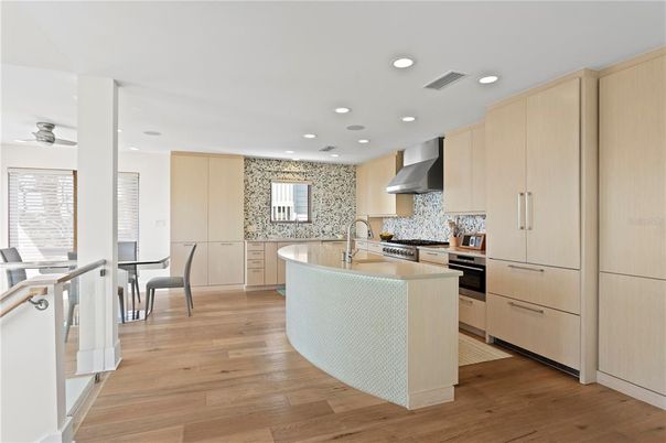 Dining room, Interior, Kitchen, Recessed Lighting, Stainless Steel Appliances, Wood Texture Flooring