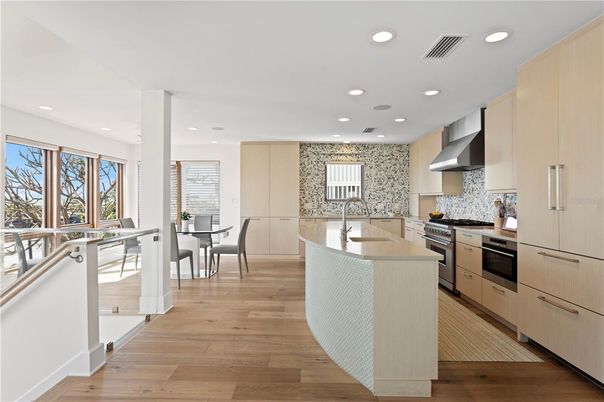 Dining room, Interior, Kitchen, Recessed Lighting, Stainless Steel Appliances, Wood Texture Flooring