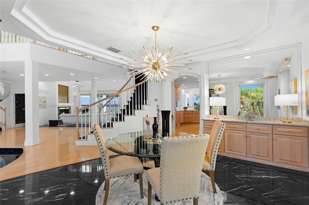 Chandelier, Dining room, Interior, Marble, Pendant Lights, Recessed Lighting, Wood Texture Flooring