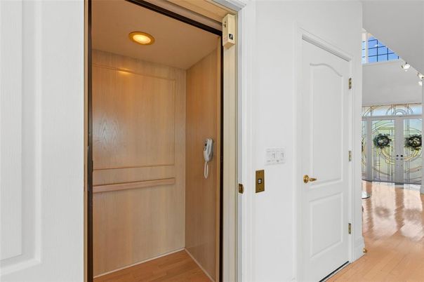 Elevator, Interior, Recessed Lighting, Wood Texture Flooring, Wooden Walls
