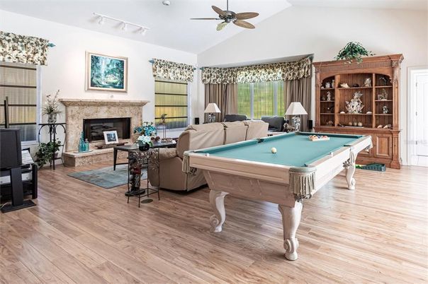 Billiard Table, Fireplace, Game Room, Interior, Living room, Wood Texture Flooring