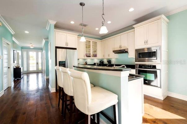 Interior, Kitchen, Pendant Lights, Recessed Lighting, Stainless Steel Appliances, Wood Texture Flooring