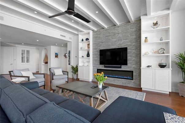 Fireplace, Interior, Living room, Recessed Lighting, Stone Walls, Wood Texture Flooring