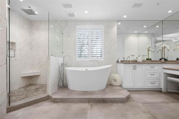 Bathroom, Dual Sink Vanities, Free Standing Baths, Glass Shower, Interior, Marble Walls, Recessed Lighting