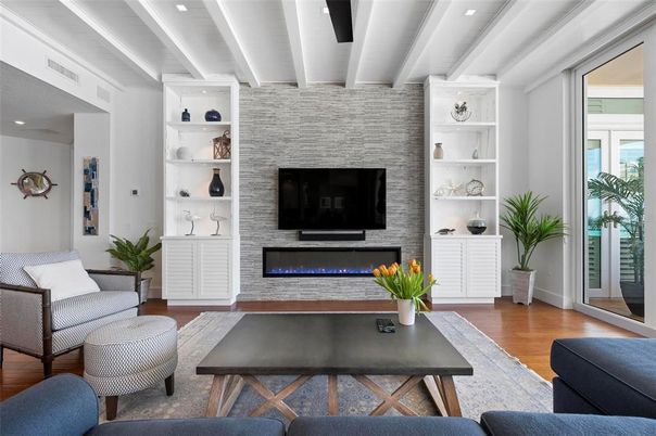 Fireplace, Interior, Living room, Recessed Lighting, Stone Walls, Wood Texture Flooring