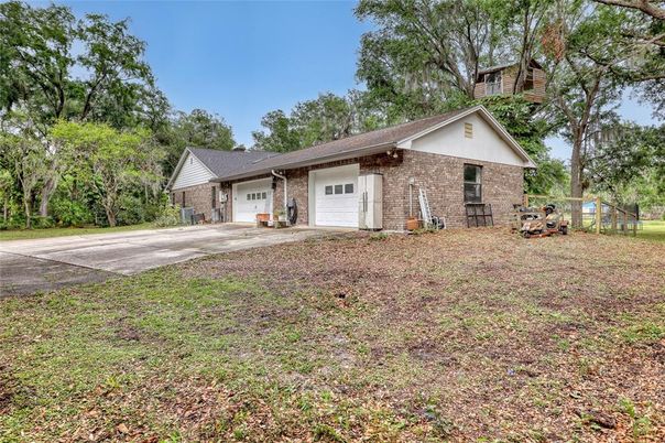 Attached, Backyard, Exterior, Facade, Brick Facade, Ranch
