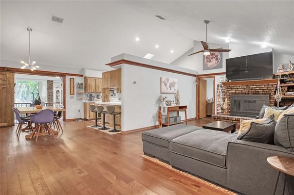Dining room, Fireplace, Interior, Kitchen, Living room, Recessed Lighting, Wood Texture Flooring