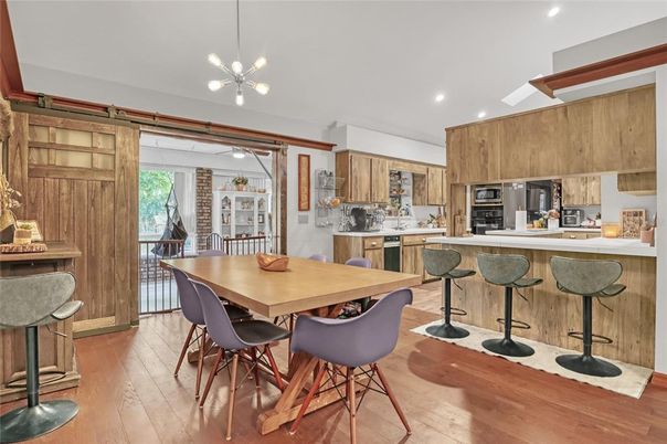 Dining room, Interior, Kitchen, Pendant Lights, Recessed Lighting, Stainless Steel Appliances, Wood Texture Flooring