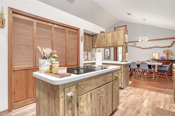 Dining room, Interior, Kitchen, Pendant Lights, Tile Countertops, Wood Texture Flooring