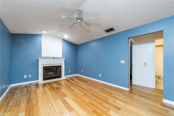 Empty room, Fireplace, Interior, Recessed Lighting, Wood Texture Flooring
