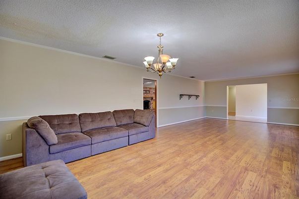 Chandelier, Empty room, Fireplace, Interior, Living room, Wood Texture Flooring