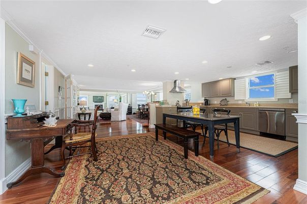 Dining room, Interior, Kitchen, Recessed Lighting, Stainless Steel Appliances, Wood Texture Flooring