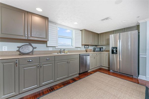 Interior, Kitchen, Recessed Lighting, Stainless Steel Appliances, Wood Texture Flooring