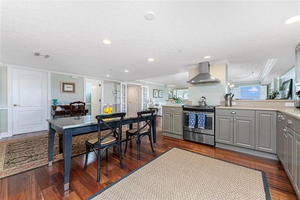 Dining room, Interior, Kitchen, Recessed Lighting, Stainless Steel Appliances, Wood Texture Flooring