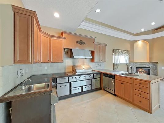 Fireplace, Interior, Kitchen, Recessed Lighting, Stainless Steel Appliances