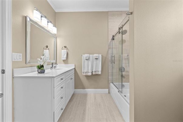 Bathroom, Dual Sink Vanities, Glass Shower, Interior, Wood Texture Flooring