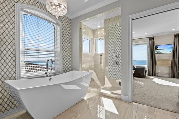 Bathroom, Chandelier, Free Standing Baths, Glass Shower, Interior, Recessed Lighting, Water