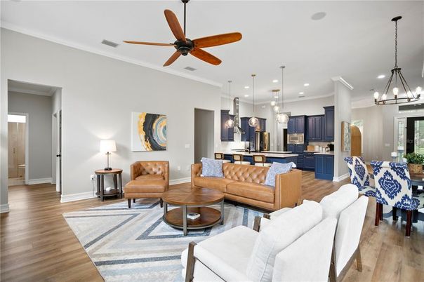 Chandelier, Dining room, Interior, Kitchen, Living room, Pendant Lights, Recessed Lighting, Stainless Steel Appliances, Wood Texture Flooring