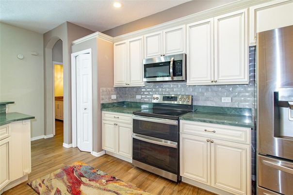 Interior, Kitchen, Recessed Lighting, Stainless Steel Appliances, Wood Texture Flooring
