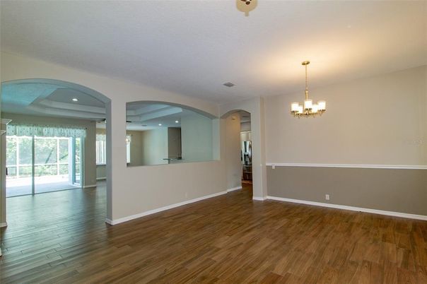 Chandelier, Empty room, Interior, Recessed Lighting, Wood Texture Flooring