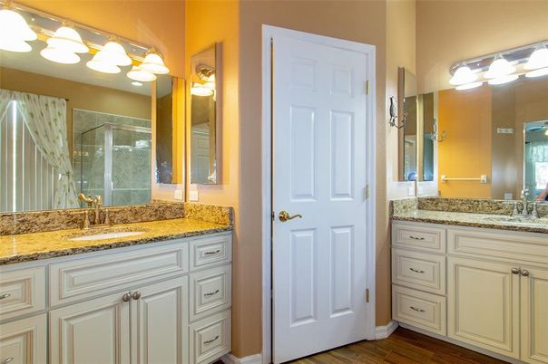 Bathroom, Dual Sink Vanities, Glass Shower, Interior, Wood Texture Flooring