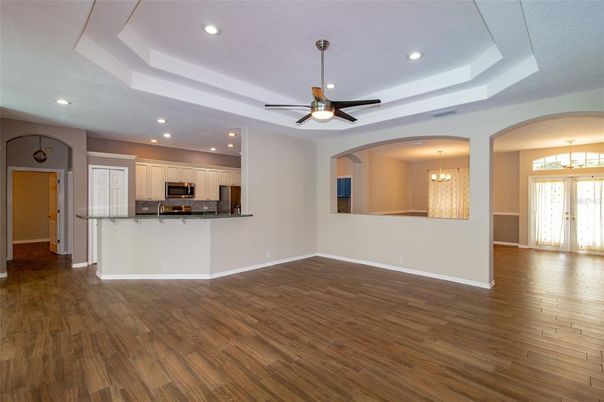 Chandelier, Interior, Kitchen, Pendant Lights, Recessed Lighting, Stainless Steel Appliances, Wood Texture Flooring