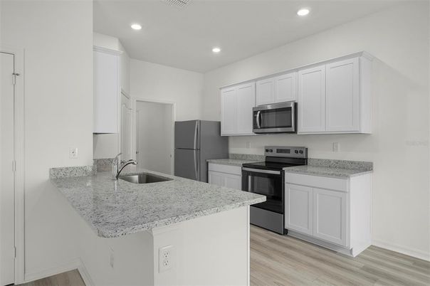 Interior, Kitchen, Recessed Lighting, Stainless Steel Appliances, Wood Texture Flooring