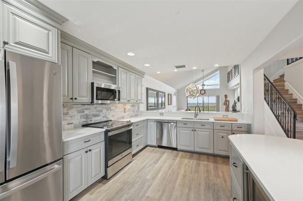 Interior, Kitchen, Pendant Lights, Recessed Lighting, Stainless Steel Appliances, Wood Texture Flooring