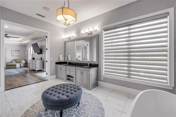 Bathroom, Dual Sink Vanities, Free Standing Baths, Interior, Marble, Wood Texture Flooring