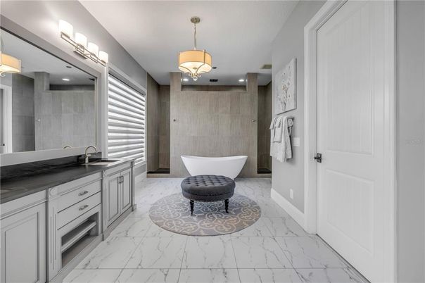 Bathroom, Dual Sink Vanities, Free Standing Baths, Interior, Marble, Pendant Lights, Recessed Lighting